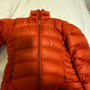 Burnt orange Patagonia jacket, some faint stains. Very warm!